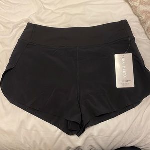 Athleta High Rise Run With It 2.5” Shorts